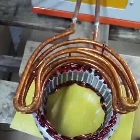 cambered induction coil for heating copper wire heads